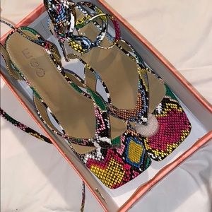 Ego Official , multi color snake skin heel